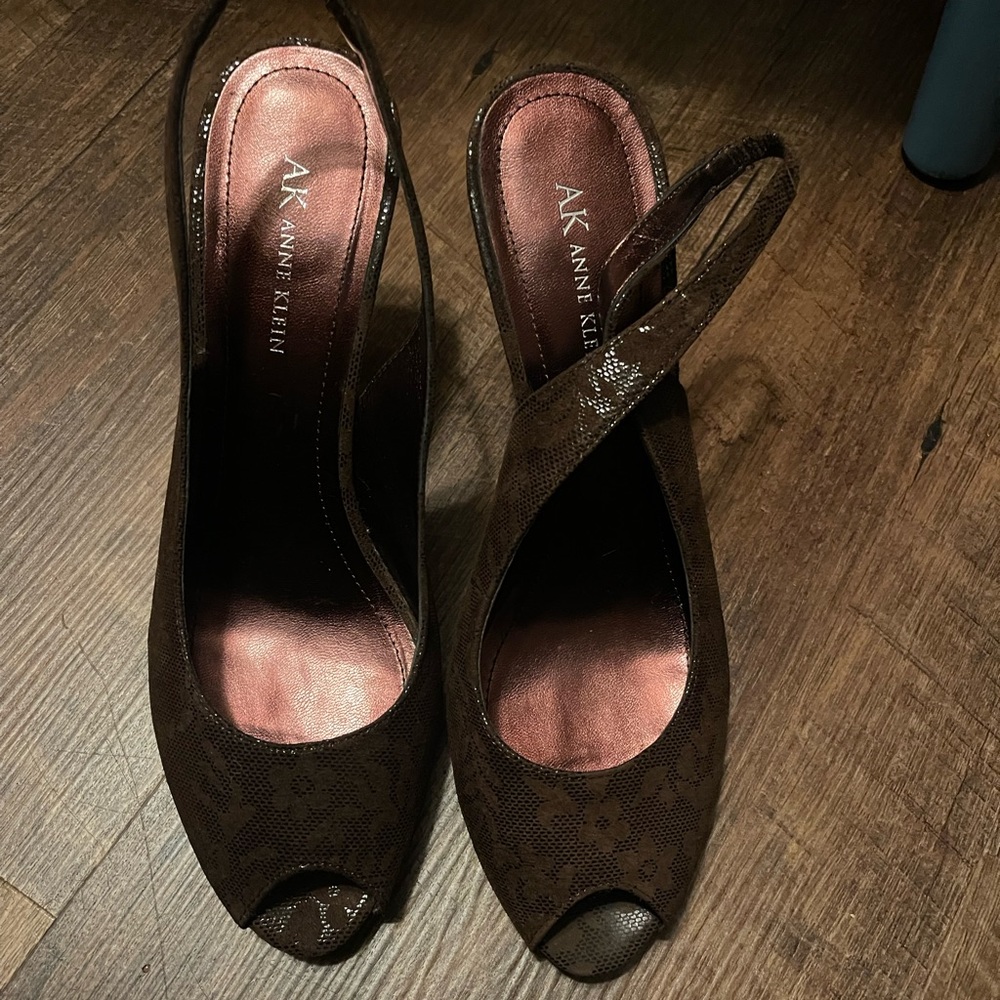 Ann Klein shoes. Worn in fair condition bottom of shoe worn.